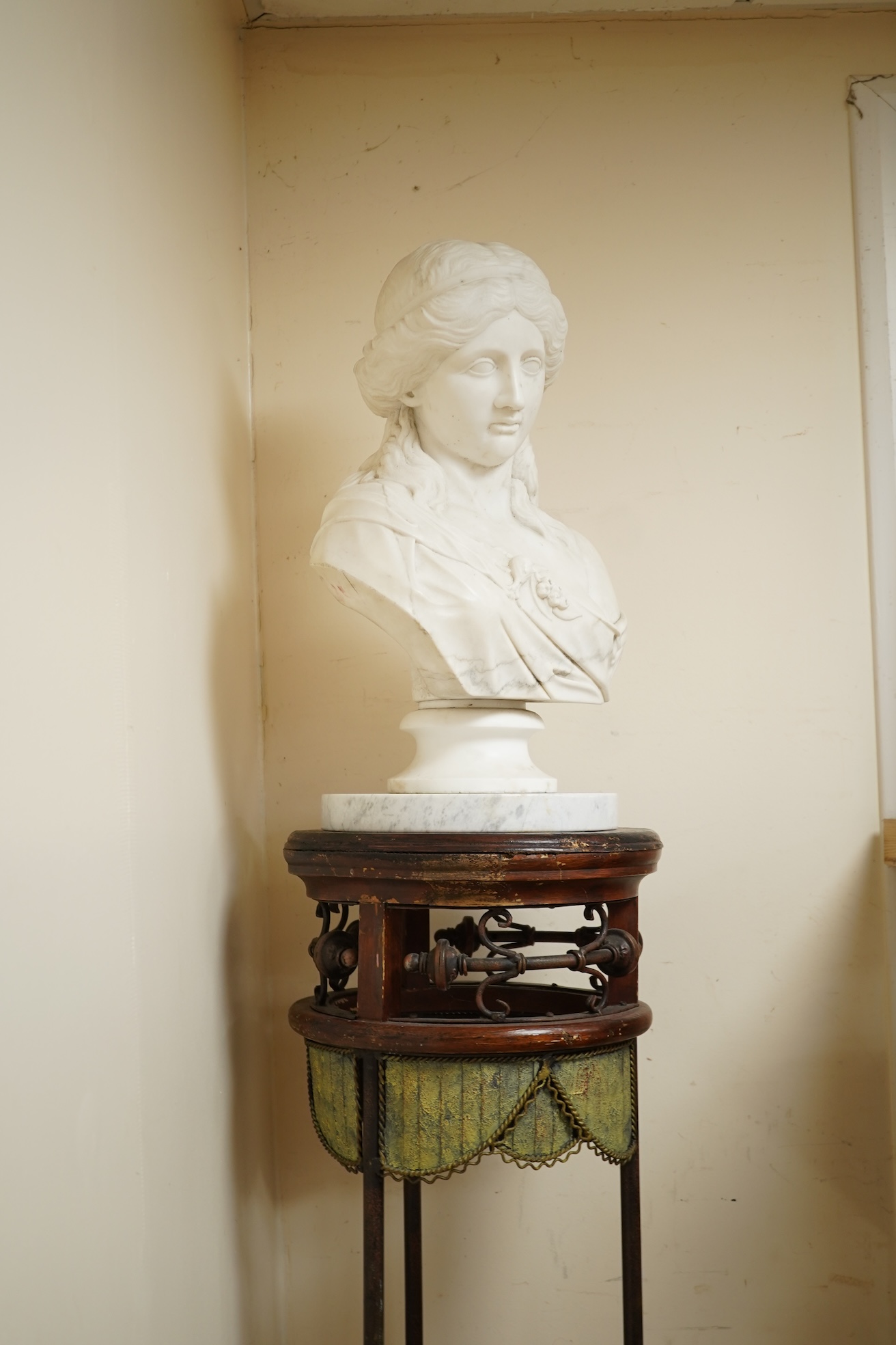 A Victorian style carved marble bust and later pedestal on ornate stand